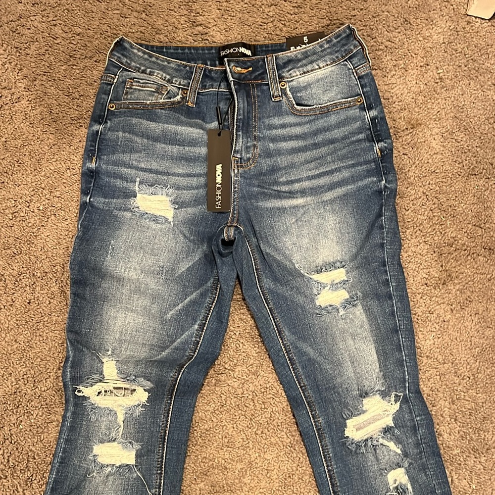 Brand new never worn fashion nova ripped jeans